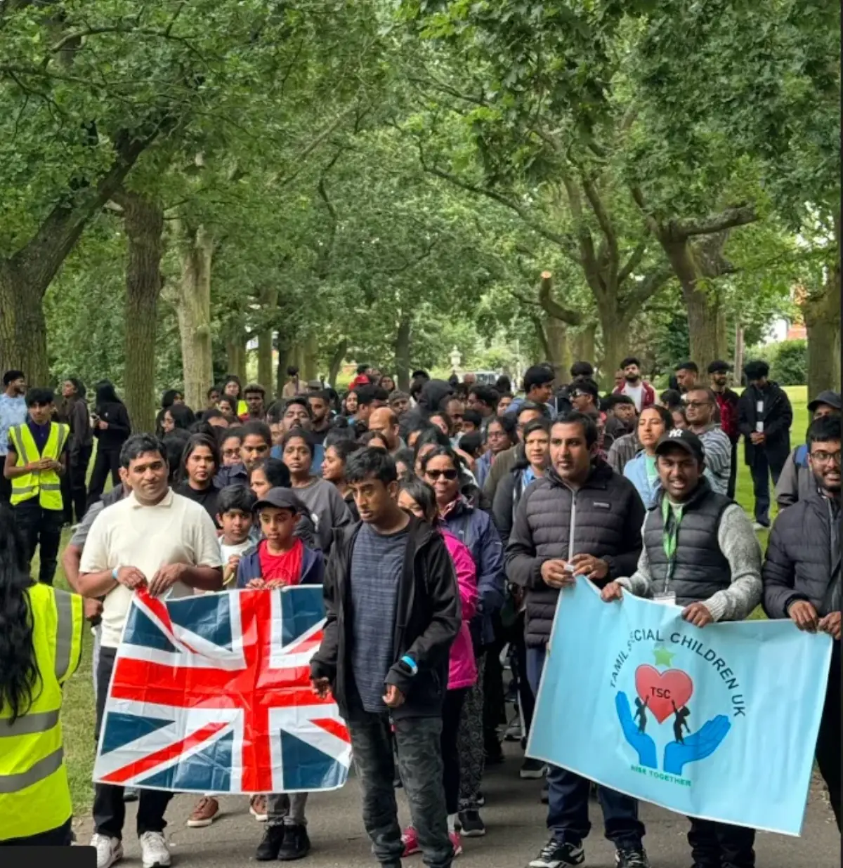 People celebrating at the charity walk event.